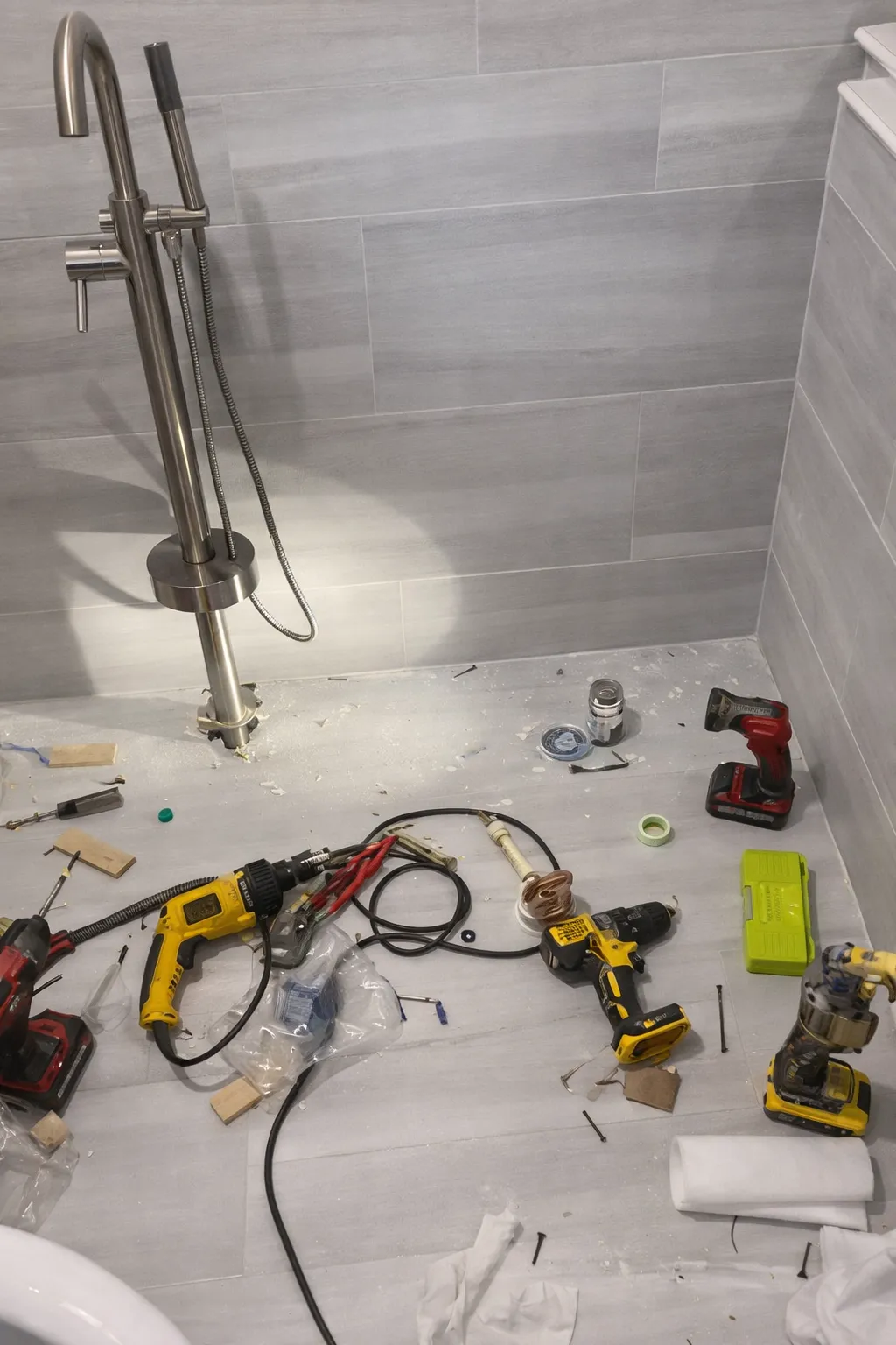 Floor-mounted tub filler plumbing installation