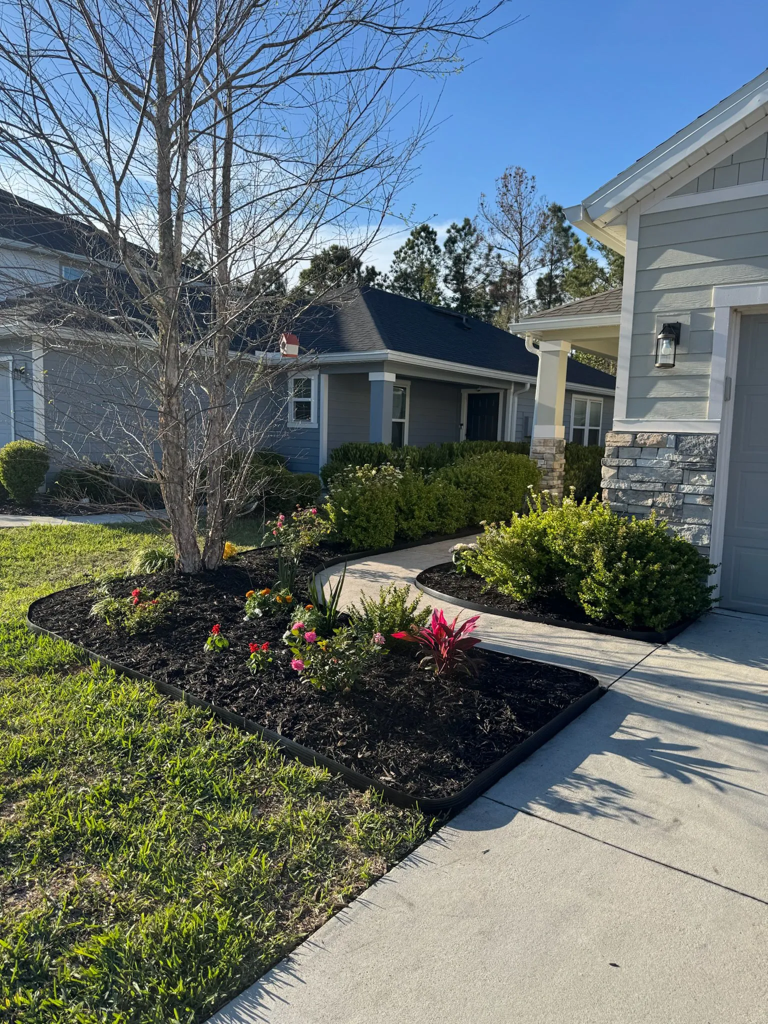 Custom walkway and landscape border installation
